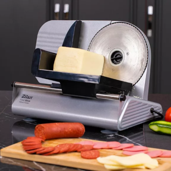 Zilan ZLN3376 szeletelőgép, 150 W, 190 mm-es forgókés, állítható szeletelési vastagság, biztonságos kivitel Zilan ZLN3376 szeletelőgép, 150 W, 190 mm-es forgókés, állítható szeletelési vastagság, biztonságos kivitel